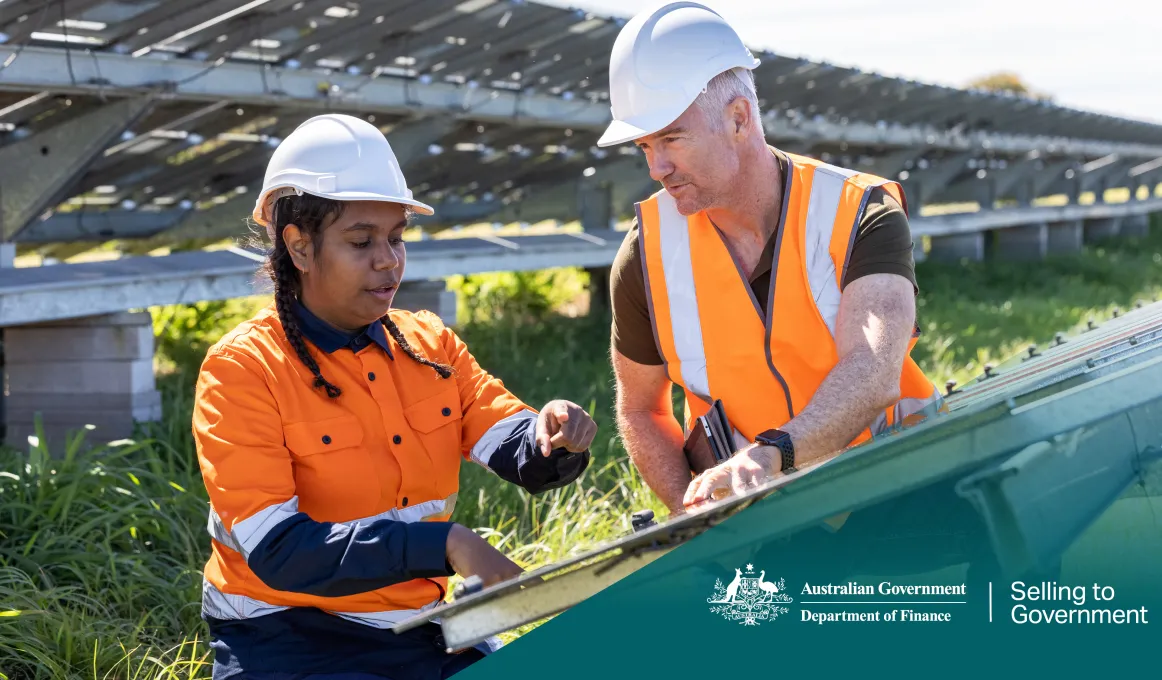 Two workers discussing