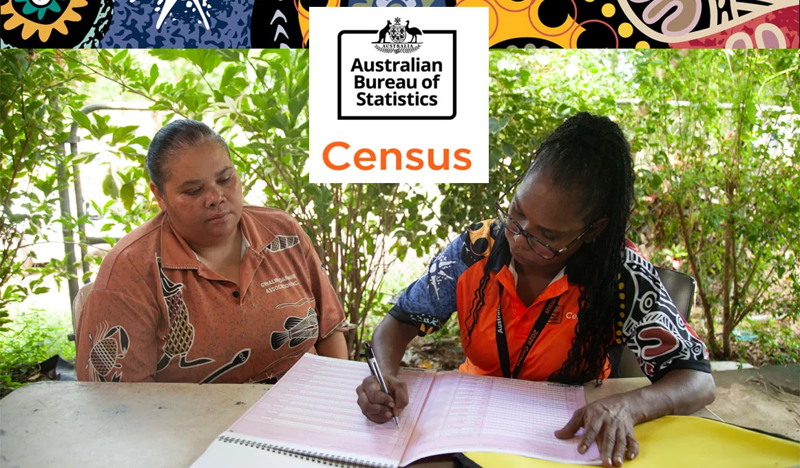 Australian Bureau of Statistics. Two women sitting at a table filling out a Census form