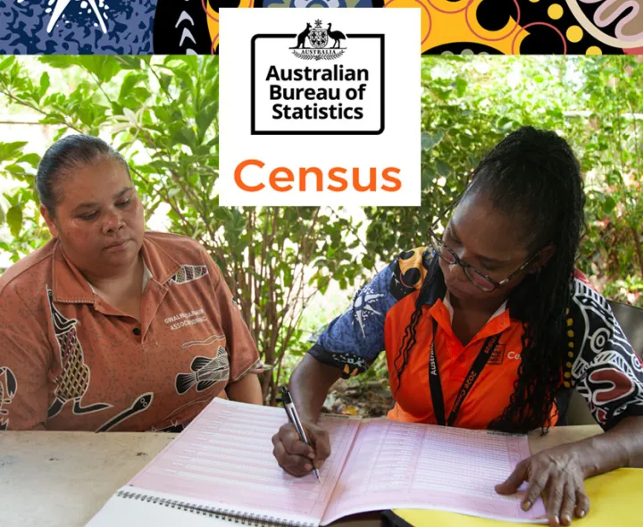 Australian Bureau of Statistics. Two women sitting at a table filling out a Census form