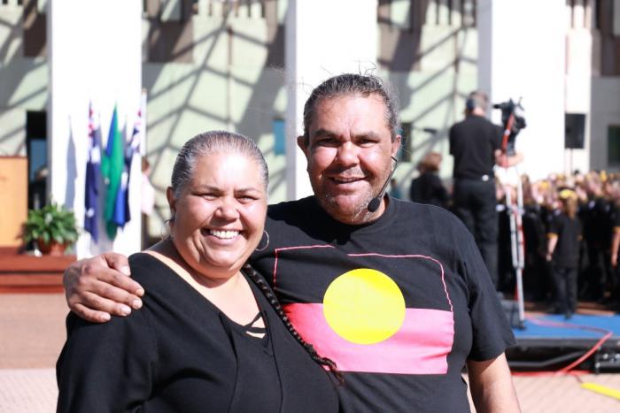 Aunty Tina and Uncle Adrian stand proudly outside Parliament House after the Welcome to Country and smoking ceremony.