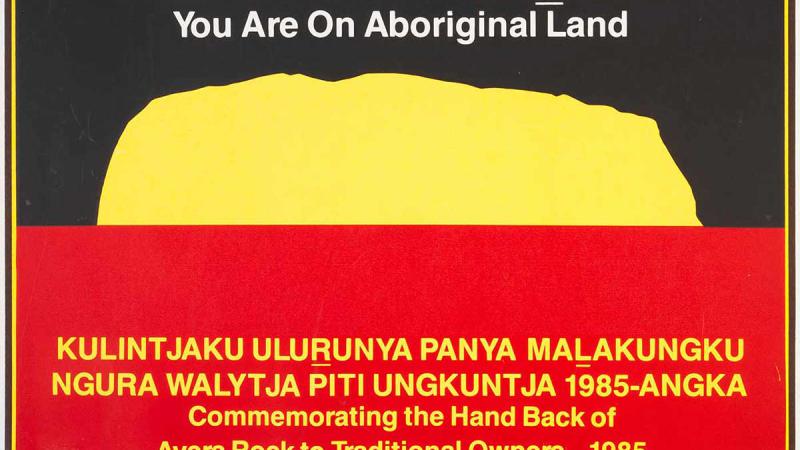 Commemorative poster from handing back of Uluru in 1985.